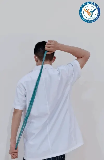 Assisted behind-the-back internal rotation